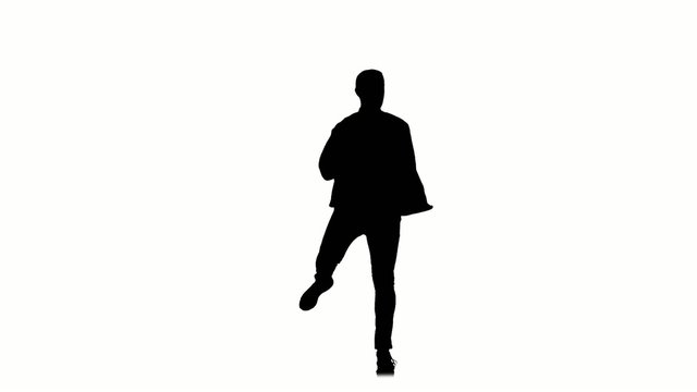 Sporty and stylish man dancing street jazz on white background