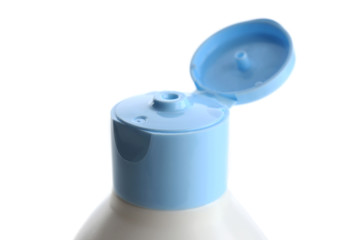 Open cosmetic bottle isolated on white