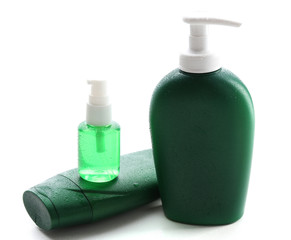 Cosmetic bottles isolated on white