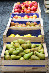 wooden crates with pears and apples