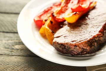 Composition with tasty roasted meat  and vegetables