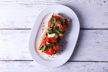 Tasty sandwich with vegetables and cheese