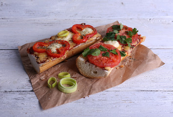 Tasty sandwich with vegetables and cheese