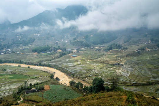 Rice terraces on a rainy and foggy day outside Sapa in Vietnam.