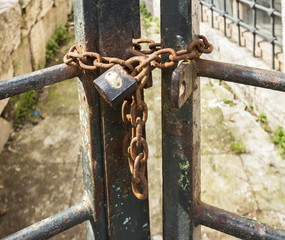 Rusty chain with a padlock