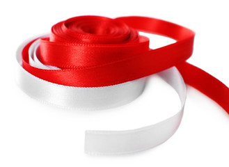 Colorful red and white ribbons isolated on white