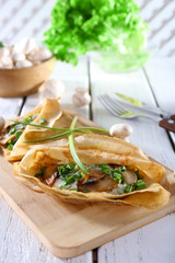 Pancakes with creamy mushrooms
