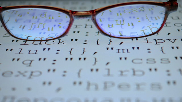 Glasses. Source program code. 4K UHD 2160p footage