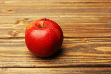 Apple on wooden background