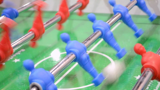 football game closeup, children's toy desktop table soccer, sport field area, modern entertainment hobby diversity