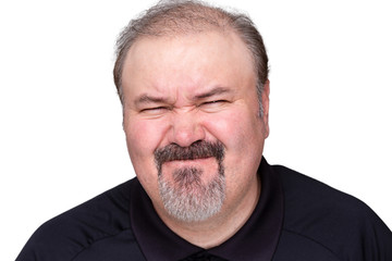 Obraz premium Disgusted man pulling a disdainful expression