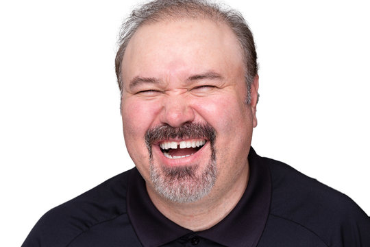 Middle-aged man enjoying a good laugh