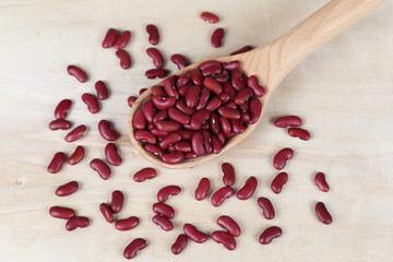 red beans in a wooden spoon