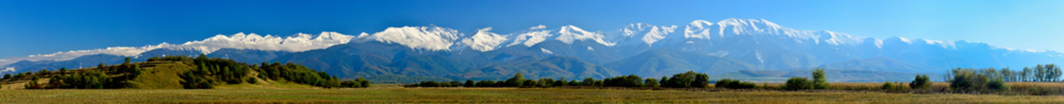 panoramic view of Fagarasi mountains snow capped range