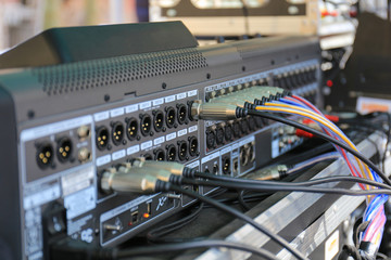 Naklejka premium Connectors is connected to sound mixer.