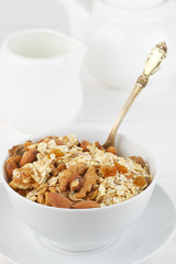 Oatmeal flakes with nuts in bowl