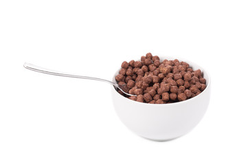 Bowl of corn flakes with milk.