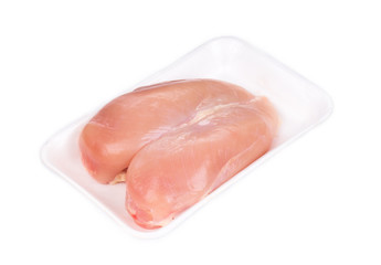 Chicken fillet in plastic box.