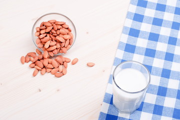 Glassware almond milk on the table top view
