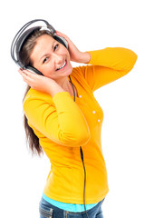 cheerful girl with a beautiful smile in headphones