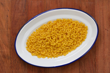 dry pasta on white dish
