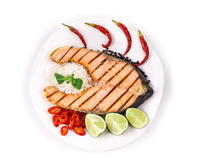 Grilled salmon steak with vegetables