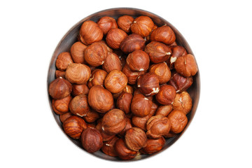 hazelnuts in metal bowl isolated