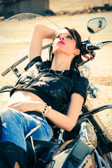 Fototapeta na wymiar girl on motorbike
