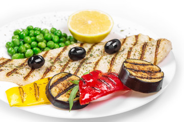Grilled fish with vegetables.