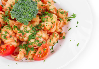 Pasta with broccoli and tomatoes.