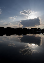 clouds over lake at the Seepark in Freiburg