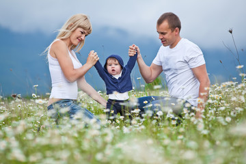 Family in a flowers field
