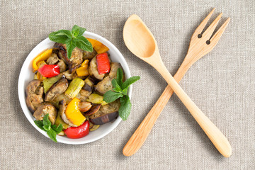 Fresh roasted or grilled vegetables with servers