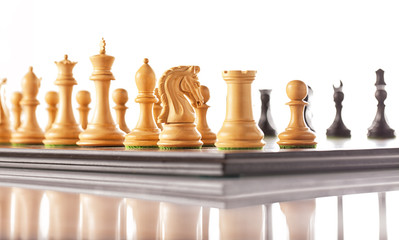 chess pieces set on a chessboard