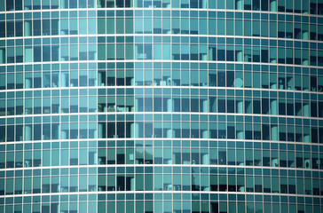 Fototapeta na wymiar Glass wall of office building with large panoramic windows