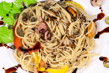 Sea salad with spaghetti.