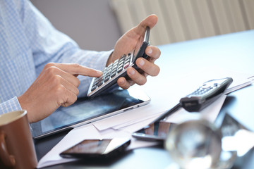 businessman with calculator