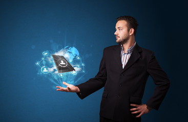 Cloud technology in the hand of a businessman