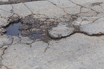 Hole in street asphalt