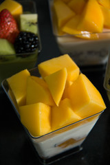 mango mousse in cup.