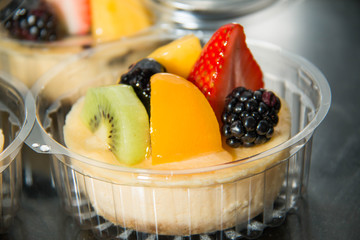 cheesecake decorated with fresh fruit