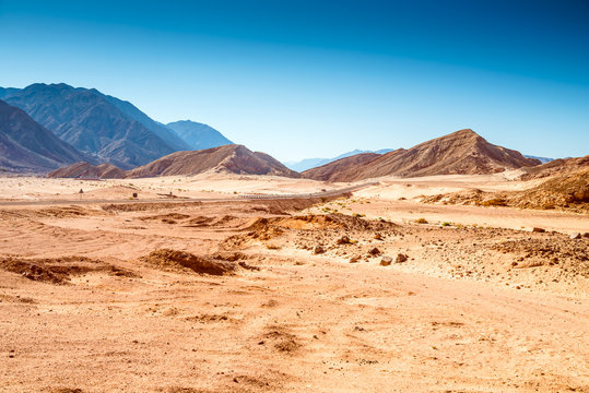 Panoramic view of road through desert with mountains,  Egypt