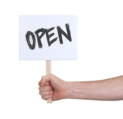 Hand holding sign, isolated on white