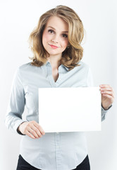Fototapeta premium Beautiful business woman in a blue shirt