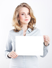 Beautiful business woman in a blue shirt