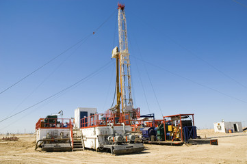 Fototapeta na wymiar Loaded drilling rig on a desert