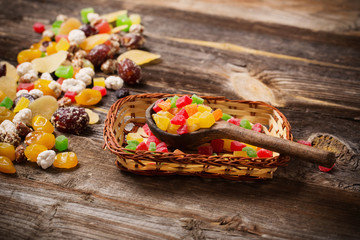 dried fruits mix on wooden background