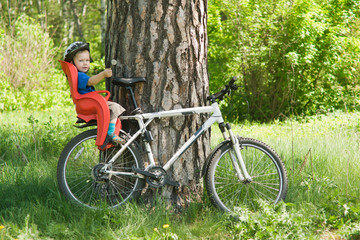 Obraz premium baby on the bicycle