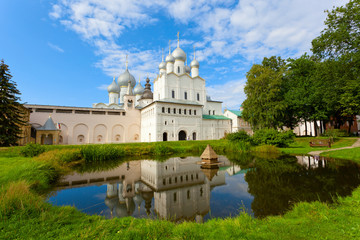 One of temples of the Rostov Kremlin is reflected in a pond