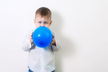 boy blue balloon inflates